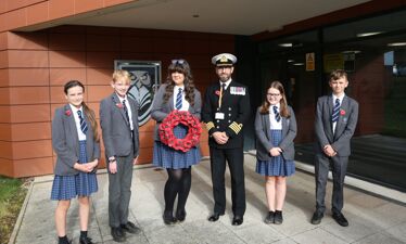 Staff and students gathered together today to mark Remembrance Day